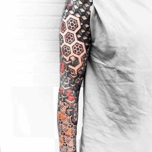 tatuaje geometría de brazo completo a color